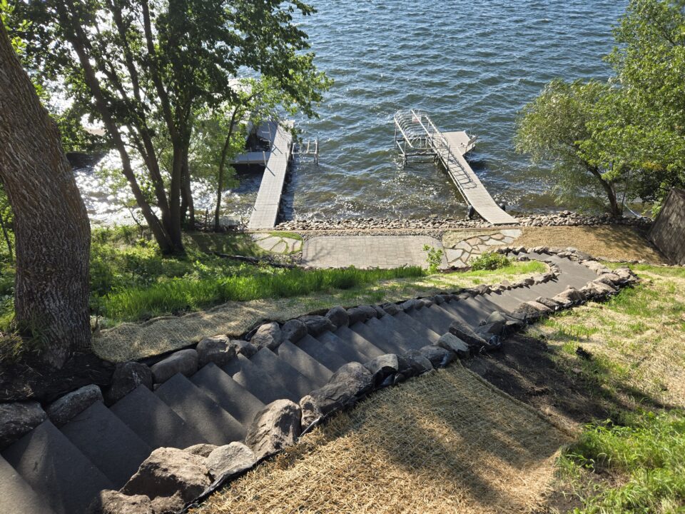 Aerial view of lakeside steps to lake