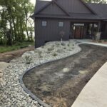 Boulder wall with rock garden