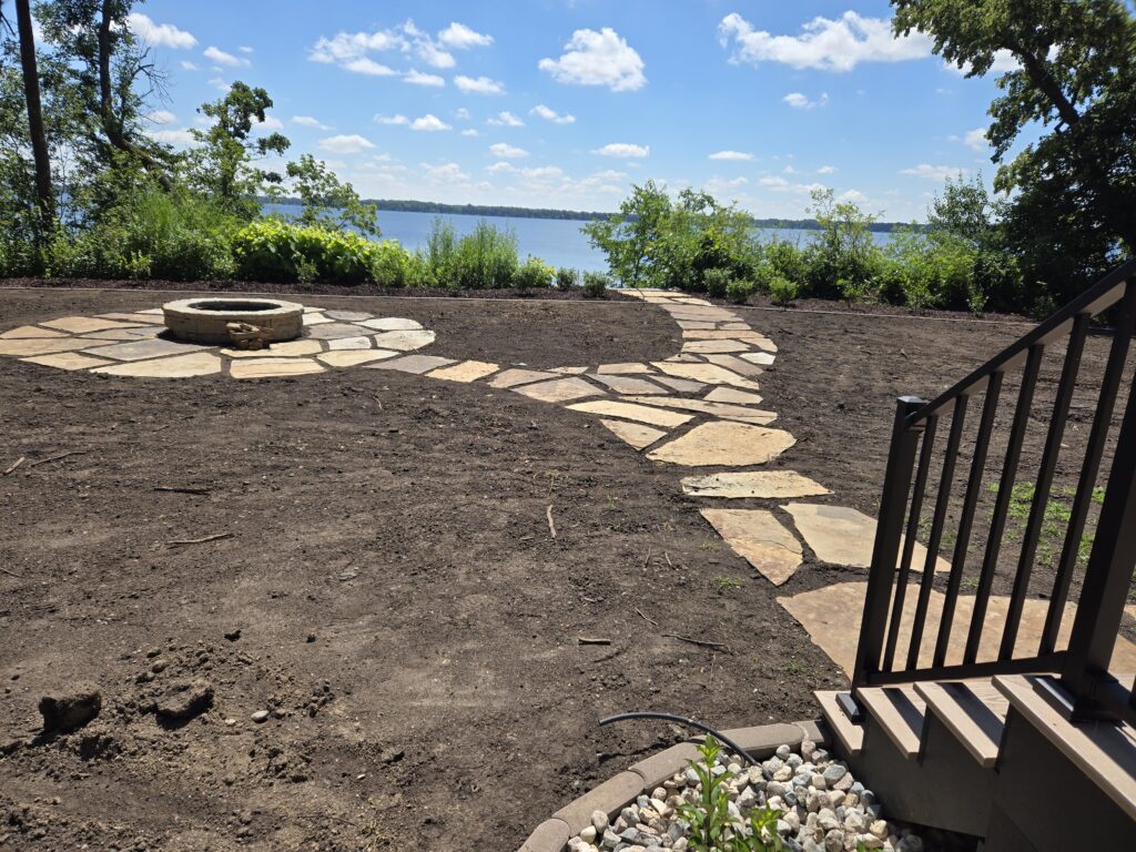 Flagstone walkway to patio and lake stairs